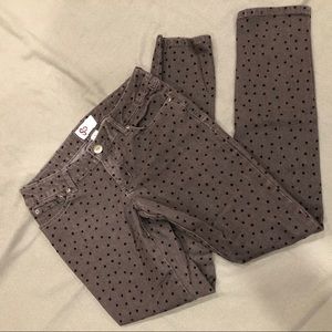 Gray skinny jeans with black hearts